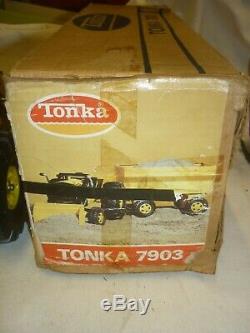 A Vintage Tonka toys Canada, front loading tractor & trailer, boxed