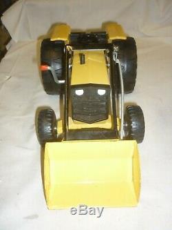 A Vintage Tonka toys Canada, front loading tractor & trailer, boxed