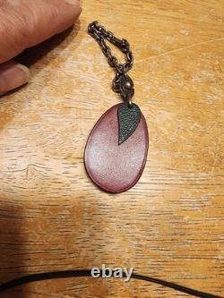 Vintage Hermès leather plum fruit bag charm and keychain featuring burgundy box
