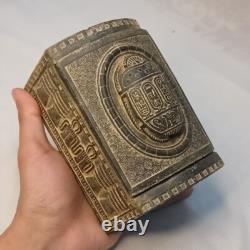 Vintage-style scarab box featuring Egyptian hieroglyphs and stone texture