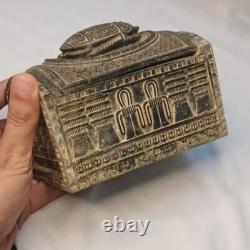 Vintage-style scarab box featuring Egyptian hieroglyphs and stone texture