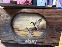 Vintage wooden box with mallard ducks scene